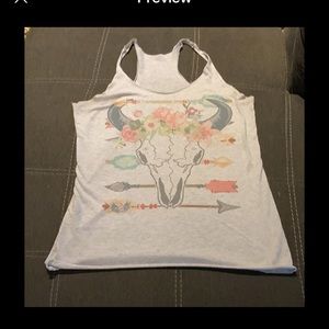 Super cute and comfy tank I purchased at a boutique. Size med